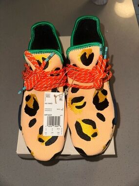 Adidas x Pharrell NMD Hu 'Animal Print' sneakers in the "Orange" colorway